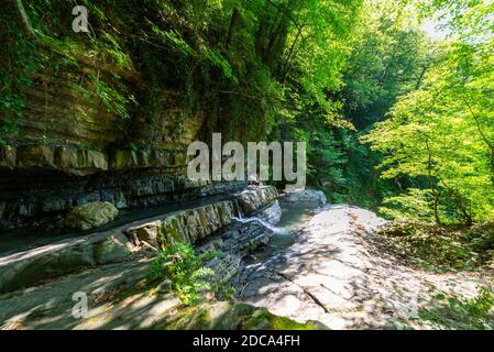 Textures of various stone layers in mountain river Stock Photo