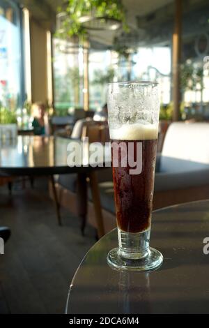 Glass of Abbey Beer in the restaurant Stock Photo