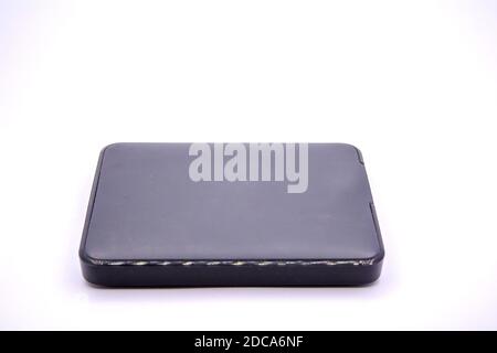 HDD - Grey Portable External Hard Disk Drive isolated on white background. External hard disk drives. Stock Photo