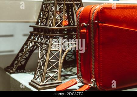 Parisian French fashion week handbags style clutch sale Eiffel Tower symbol Stock Photo