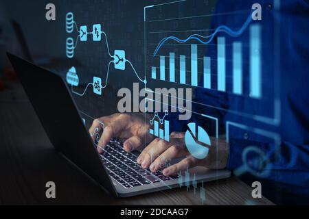 Analyst working with Business Analytics and Data Management System on computer to make report with KPI and metrics connected to database. Corporate st Stock Photo