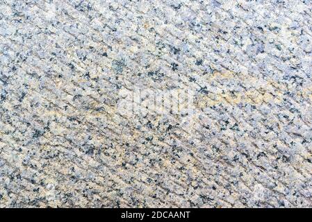 Granite stone texture with speckled surface pattern Stock Photo
