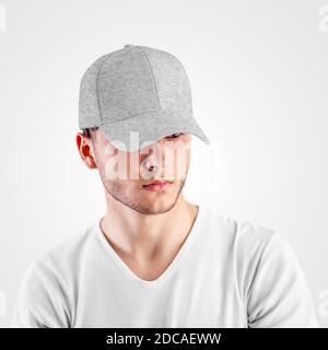 Mockup of gray heather baseball cap on a man's head, isolated on background, front view. Template of a sports, fashionable panama with a visor, for th Stock Photo
