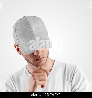 Heather gray baseball cap template, hat with a visor on the man's head, for presentation of design, print. Mockup of fashionable headdress for sun pro Stock Photo