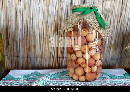 Apple compote in glass jar on table Stock Photo