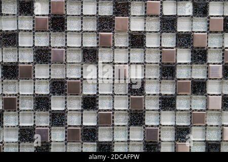 Many small glass squares for decorative wall cladding background Stock Photo