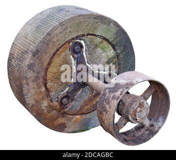 Abandoned rotten  old  millstone  from stone and rusted steel . Isolated on white Stock Photo