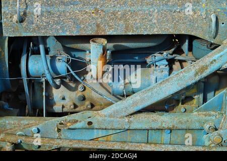 Rusty  vintage  small  tractors  diesel engine painted  blue Stock Photo