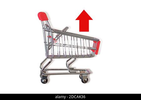Shopping cart with red up arrow on white background - Concept of remove from cart Stock Photo