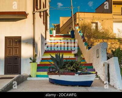 LAMPEDUSA, ITALY - Oct 22, 2020: colored staircase in the city of Lampedusa that leads from the town to the old port Stock Photo