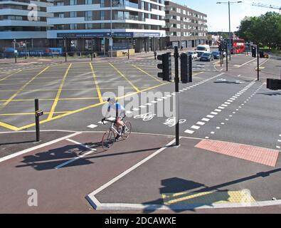 London, UK. The newly remodelled junction of Lea Bridge Road and Orient Way includes segregated cycle lanes, part of Waltham Forests Mini-Holland plan Stock Photo