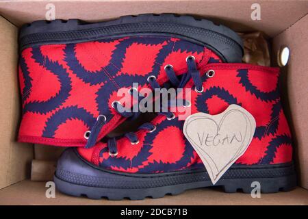 Vivienne Westwood red squiggle design vegan trainers Stock Photo 