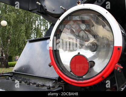 Antique locomotive electric headlight. Detail. Stock Photo