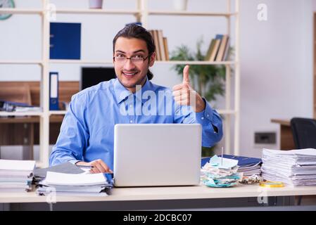 Young bookkeper in budget planning concept Stock Photo