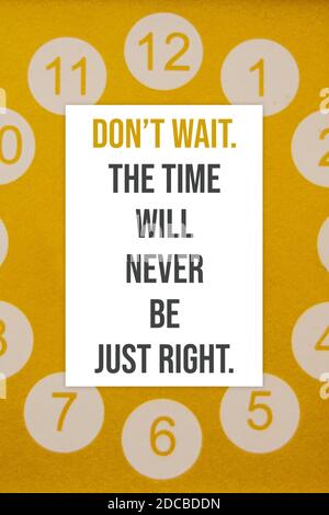 Don’t wait. The time will never be just right motivational quotes poster Stock Photo