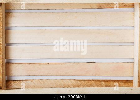 Texture of the slats of an Empty Wooden box for vegetables and fruits. Top view, free space. Stock Photo