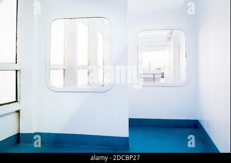 Shots of the windows and deck walls of a ferry crossing between Corsica and Nice France. Stock Photo