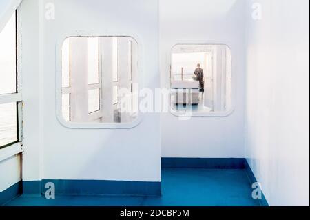 Shots of the windows and deck walls of a ferry crossing between Corsica and Nice France. Stock Photo