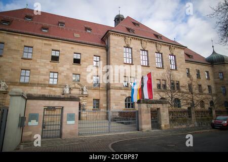 Nuremberg, Germany. 20th Nov, 2020. The museum 'Memorium Nuremberg Trials' with the jury courtroom 600 in the building in the background at the District Court Nuremberg-Fürth. After the end of the Second World War, the world looked upon Courtroom 600. Until 1949, the Nuremberg Trials took place in today's jury courtroom. Today is the 75th anniversary of the beginning of the Nuremberg Trials. Credit: Daniel Karmann/dpa/Alamy Live News Stock Photo