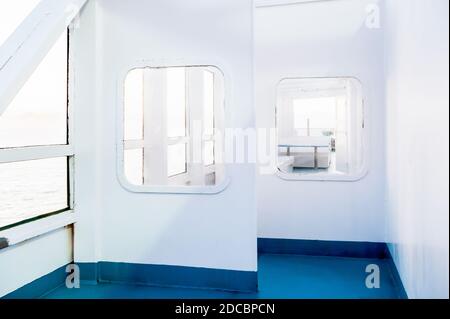 Shots of the windows and deck walls of a ferry crossing between Corsica and Nice France. Stock Photo