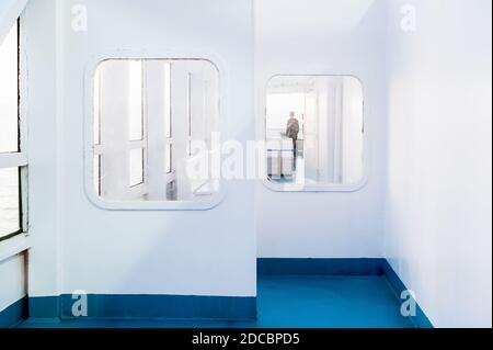 Shots of the windows and deck walls of a ferry crossing between Corsica and Nice France. Stock Photo