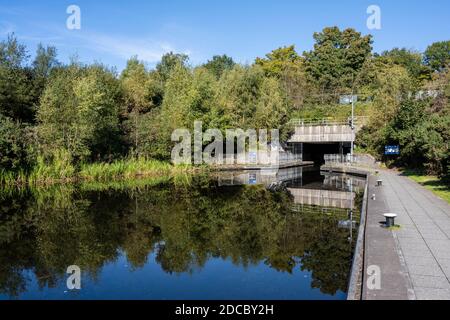 Canal basin and entrance to Roughcastle Tunnel and aqueduct leading to the Falkirk Wheel in Falkirk, Scotland, UK Stock Photo