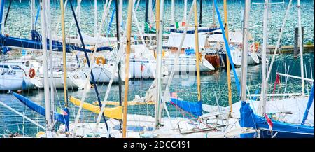 Yachts on an anchor in harbor. Selective focus. Stock Photo