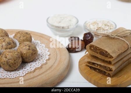 Dried fruit and oatmeal sweets. Homemade Nut & Dried Fruit Energy Bars. Wrapped in paper and tied with twine. Stock Photo