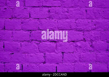 Abstract brick wall texture background, purple color. Stone blocks. Architecture wallpaper. Background, texture Stock Photo