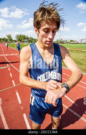 Miami Florida,Tropical Park Greater Miami Athletic Conference championships,track & field high school student students competitor competing,runner set Stock Photo