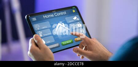 Online Home Control And Security On Tablet Stock Photo