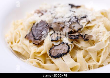 black truffle on home made pasta Stock Photo