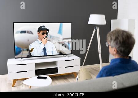 Watching TV. Streaming Television Movie At Home Stock Photo