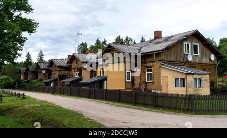 Old Wooden Houses Built for Paper Mill Workers in Ligatne. Wooden Row House Stock Photo