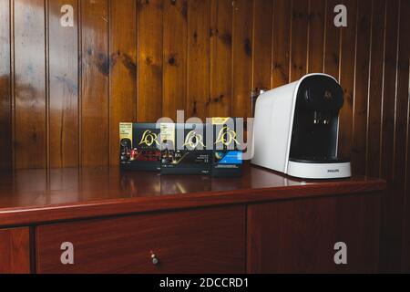 Barcelona, Spain - 13-11-2020: L'or barista by Philips coffee machine in  satin white color, with their double and decaf capsules packaging on wooden  b Stock Photo - Alamy