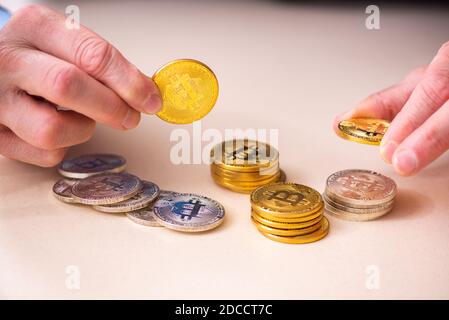 Man earning money via Internet in cryptocurrency concept Stock Photo