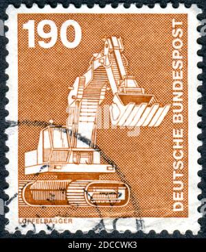 GERMANY - CIRCA 1982: A stamp printed in Germany, shown of the Excavator, Mechanical Shovel, circa 1982 Stock Photo