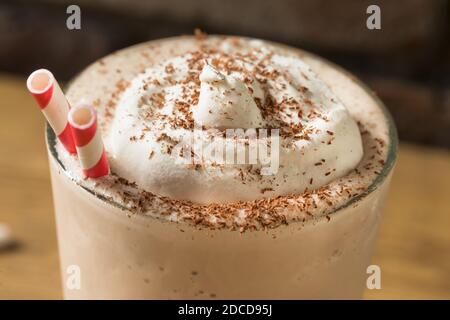 Homemade Chocolate Ice Cream Milkshake with Whipped Cream Stock Photo