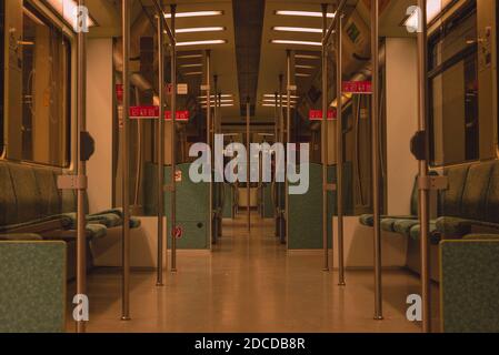 Inside the wagon the yellow line of the Metro Stock Photo - Alamy