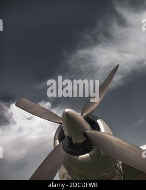 Illustration, Propeller plane flying against blue sky Stock Photo - Alamy