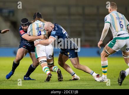 20th November 2020; AJ Bell Stadium, Salford, Lancashire, England; English Premiership Rugby, Sale Sharks versus Northampton Saints; Alex Moon of Northampton Saints is tackled by Bevan Rodd and Jake Cooper-Woolley of Sale Sharks Credit: Action Plus Sports Images/Alamy Live News Stock Photo