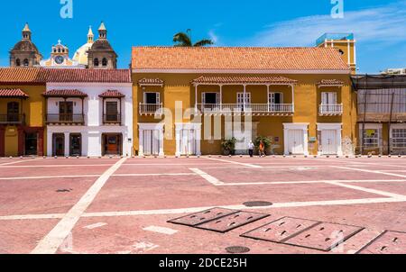 Cartagena, Colombia -- April 21, 2018. A town square in Cartagena, Colombia stands almost empty in late morning. Columbia. Editorial use only. Stock Photo