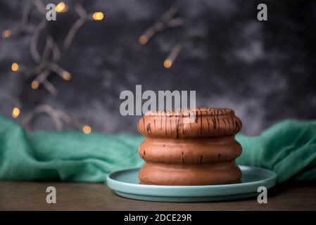 Traditional german christmas chocolate cake called Baumkuchen, winter season sweets, empty copy space Stock Photo