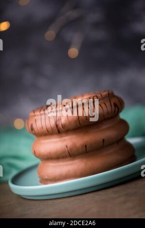 Traditional german christmas chocolate cake called Baumkuchen, winter season sweets, empty copy space Stock Photo