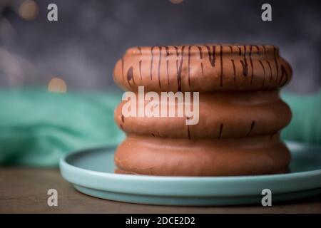 Traditional german christmas chocolate cake called Baumkuchen, winter season sweets, empty copy space Stock Photo