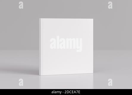 Hardcover square white mockup book standing on the white background Stock Photo