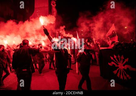 Madrid, Spain. 20th Nov, 2020. Far right wing supporters with flares during a rally to commemorate the death anniversary of Falange founder Jose Antonio Primo de Rivera. Credit: Marcos del Mazo/Alamy Live News Stock Photo