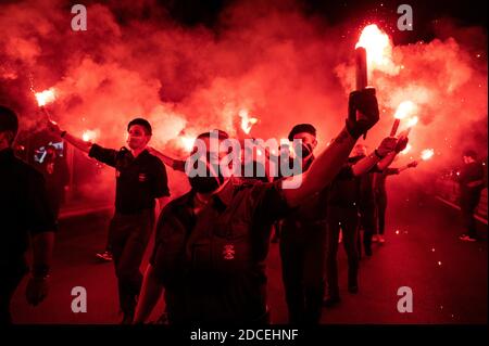 Madrid, Spain. 20th Nov, 2020. Far right wing supporters with flares during a rally to commemorate the death anniversary of Falange founder Jose Antonio Primo de Rivera. Credit: Marcos del Mazo/Alamy Live News Stock Photo