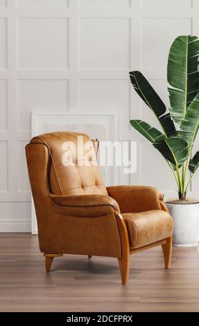 single sofa in modern space and parquet floor and green banana vase Stock Photo