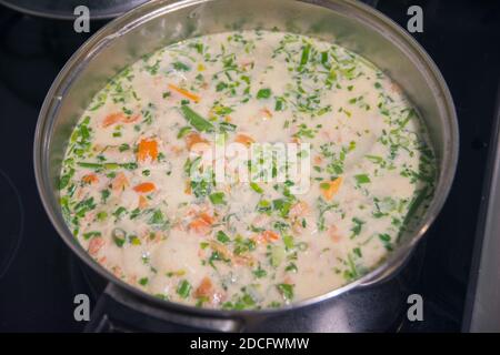 Ciorba Radauteana , a typical sour chicken soup, originally from the city of Radauti, in the historical region of Bukovina, Romania Stock Photo